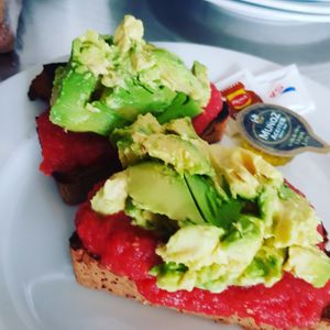 Avocado and Tomato tostadas. 
Gluten free  avalible. 
 at Good Stuff Cafe in Nerja