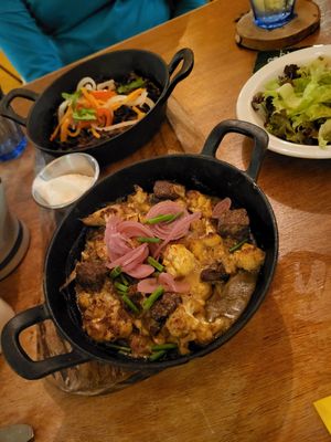 Cauliflower seitan stroganoff and flying frog at Cometa in Amsterdam
