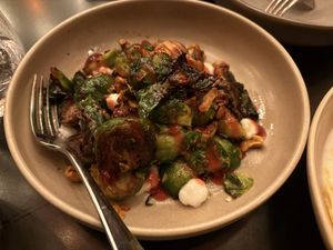 Grilled Brussel sprouts, Davidson Plum and cashew sambal   at Tonic & Ginger in Fremantle