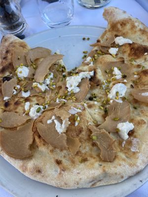Focaccia (it was basically a dry pizza lol)  at La Soffitta Renovatio in Rome