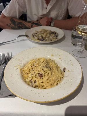 front: vegan carbonara, back: vegan gorgonzola gnocchi  at La Soffitta Renovatio in Rome