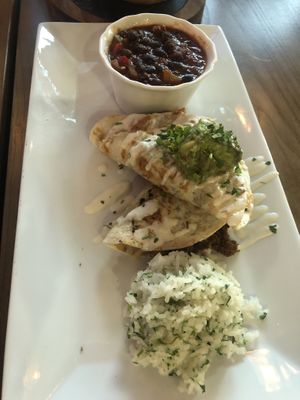 Quesadillas with chorizo filling and cheese and avocado on top. Beans and rice on the side. at Bat 17 in Lombard