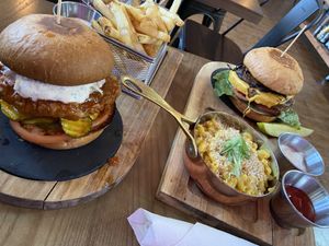 Chicken sandwich and bat-less cheeseburger with mac n cheese and fries. at Bat 17 in Lombard