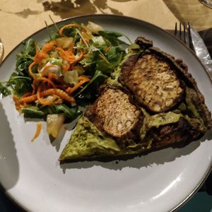 Kind of tarte with eggplant and a salad side dish at Il Moderno in Perugia