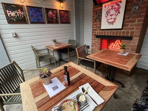 Apple and Damson Crumble w/ vegan Ice Cream cool little nooks off back patio are modern and heated if necessary.  at The Red Lion in Oxford