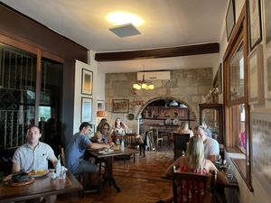 Indoors seating and wine cellar at Aprazivel in Rio De Janeiro