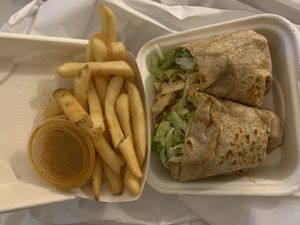 Chipotle chicken wrap (grilled chicken), papas, spicy garlic buffalo sauce at Side Chicks in San Antonio
