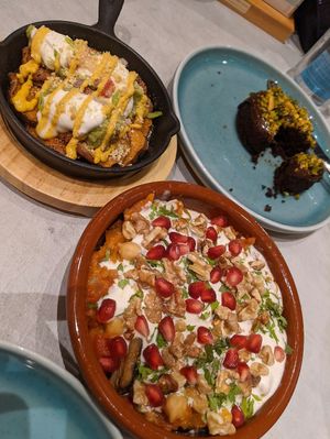 Vegan fatter, donut and potato nachos. at Alkalime in Abu Dhabi