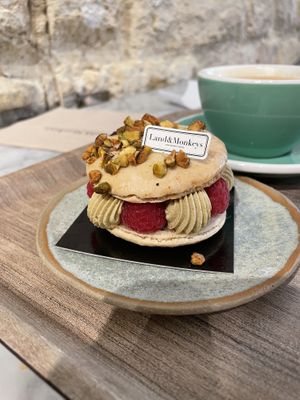 Pistachio raspberry macrony thing  at Land & Monkeys - Amsterdam in Paris