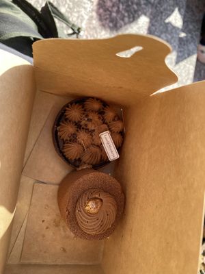 Two chocolate tortes. The bottom/square one was the hazelnut one - exceptional!  at Land & Monkeys - Amsterdam in Paris