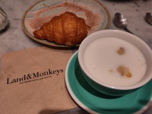 Coffee and croissant at Land and Monkeys, Amsterdam at Land & Monkeys - Amsterdam in Paris