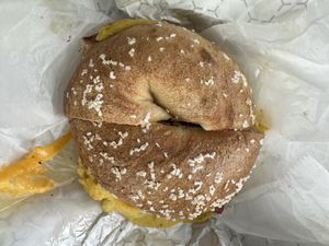 Vegan BEC with pepper and ketchup on a toasted salt bagel  at Utopia Bagels in Queens
