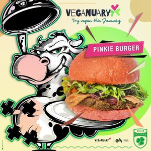 beetroot bun with poppy seeds, seitan and kidney beans burger with onions, pumpking, pepper jelly, arugola and sundried tomato spread at Old Square in Cagliari