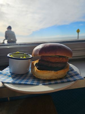 Vegan breakfast bap....mushroom, hash brown, pattie, avo on side at Perch on Lancing Beach in Lancing