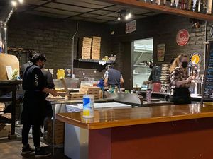 Preparing fresh homemade wood-fired pizza, and loving to use local ingredients to bring a little soul to everyone at Old Soul Pizza in Roseburg