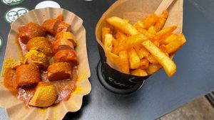 Currywurst with mild currysauce and french fries   at Curry & Co in Chemnitz