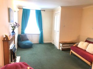 A cosy window seat at Tin Lid Cottage in Banton