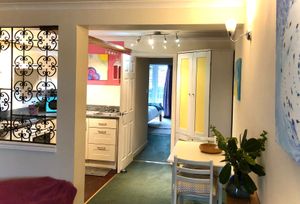 Through to the kitchen and dining area at Tin Lid Cottage in Banton