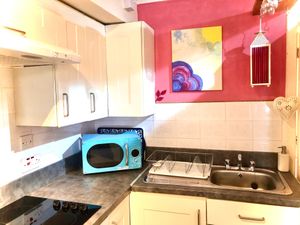 The kitchen  at Tin Lid Cottage in Banton