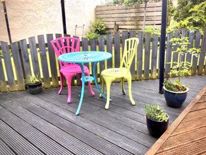 The patio, for dry days and sunshine!  at Tin Lid Cottage in Banton