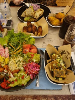 Organic tofu buddha bowl with sweet plantain and dumplings.

Sweetcorn roti roll. at Turtle Bay in Colchester