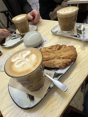 Our beautiful cappuccinos and an apple pastry   at Shluk in Trier
