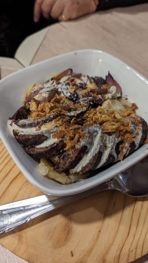 Patatas confitadas con morcill vegana y cebolla pochada (muy recomendable) at Acherito in Jaca