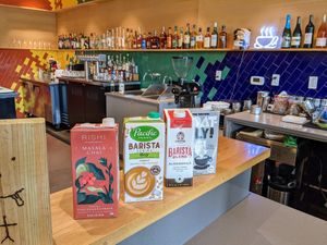 Soy, almond, or oat milk options. at Houndstooth Coffee in Austin