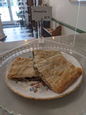 Spinakopita, a savoury slice with puff pastry, spinach, garlic and vegan cheese. Can be served with potato salad or on its own at FRONT Community Hub in Charlton Kings
