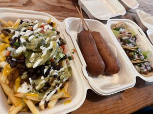 Asada fries, corn dogs, tacos, and more 💚🌱  at De La Tierra Vegan Food Truck in San Jose