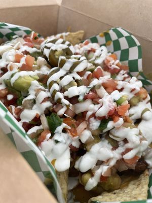 Asada nachos 😍  at De La Tierra Vegan Food Truck in San Jose