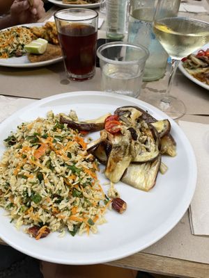 Basmati rice salad and fried eggplant with organic sparkling wine at La Cucina Dei Colori in Catania