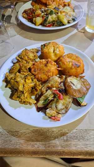 Millet Croquettes, vegan Pulled with sauteed veggies and Eggplants at La Cucina Dei Colori in Catania
