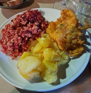 Brown Rice with pumpkin Zucchini and beets, chickpeas flour and vegetable fritters, baked potatoes with chili at La Cucina Dei Colori in Catania