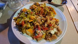 Caponata, vegan Pulled with sauteed veggies, wholewheat pasta with eggplants cherry tomatoes and cheese (vegetarian) at La Cucina Dei Colori in Catania