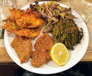 Broccoli cream spaghetti pie, seitan cutlets, chickpea flour & vegetable fritters, drunken cauliflower. at La Cucina Dei Colori in Catania