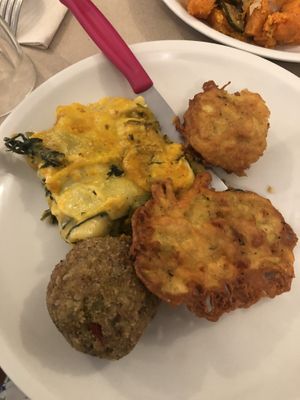Lasagne, arancino, chickpea fritter, rice ball (anticlockwise)  at La Cucina Dei Colori in Catania