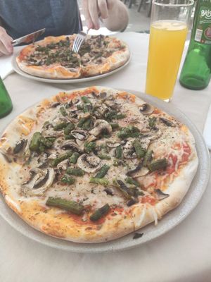 Mushroom and asparagus pizza with vegan cheese at Xarambinha in Funchal