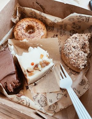 Delicious vegan chocolate cake, carrot cake, cookie doughnut, & dulce doughnut at The Chocolate Chip Bakery in Miami