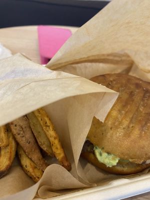 Sweet Potato Fries and Guac Vegan Burger  at The Chocolate Chip Bakery in Miami