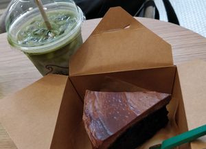 Chocolate cake and matcha latte at The Chocolate Chip Bakery in Miami