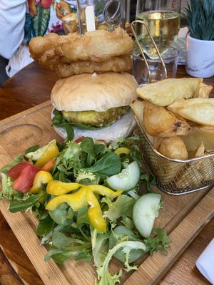 Vegan burger topped with onion rings  at Red Lion Inn in Redbourne