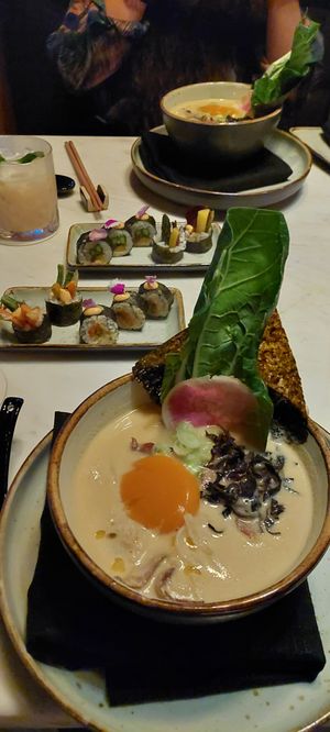 Ramen with vegan egg yolk and maki at UME in Playa Del Carmen