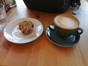Oaty muffin and flat white at The Cook in The Nook in Cosby
