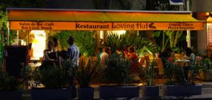 almost 10pm in the summer time; still vigorous with customers!!  at Loving Hut in Menton