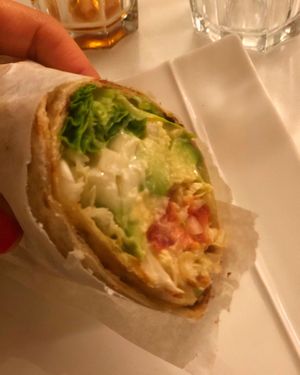Wheat tortilla with avocado and yummy stuff at Loving Hut in Menton