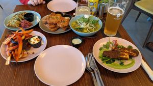 Jerk tofu, gyoza, green curry, root vegetable chips, fried mushrooms at Meat is Dead in Leeds