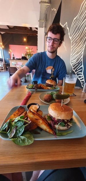 Charlie getting ready for a pint. at Meat is Dead in Leeds