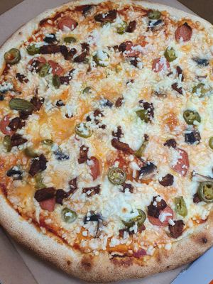 Vegan sausage, jalapeno,  olive, oomph and onion pizza at Simplicity in Cullybackey