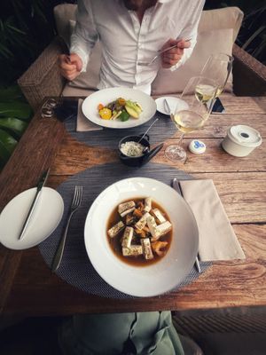 
Tofu with vegetable jus - shitake, daikon, shimeji
 and burger with curry at Avista Restaurant in Funchal
